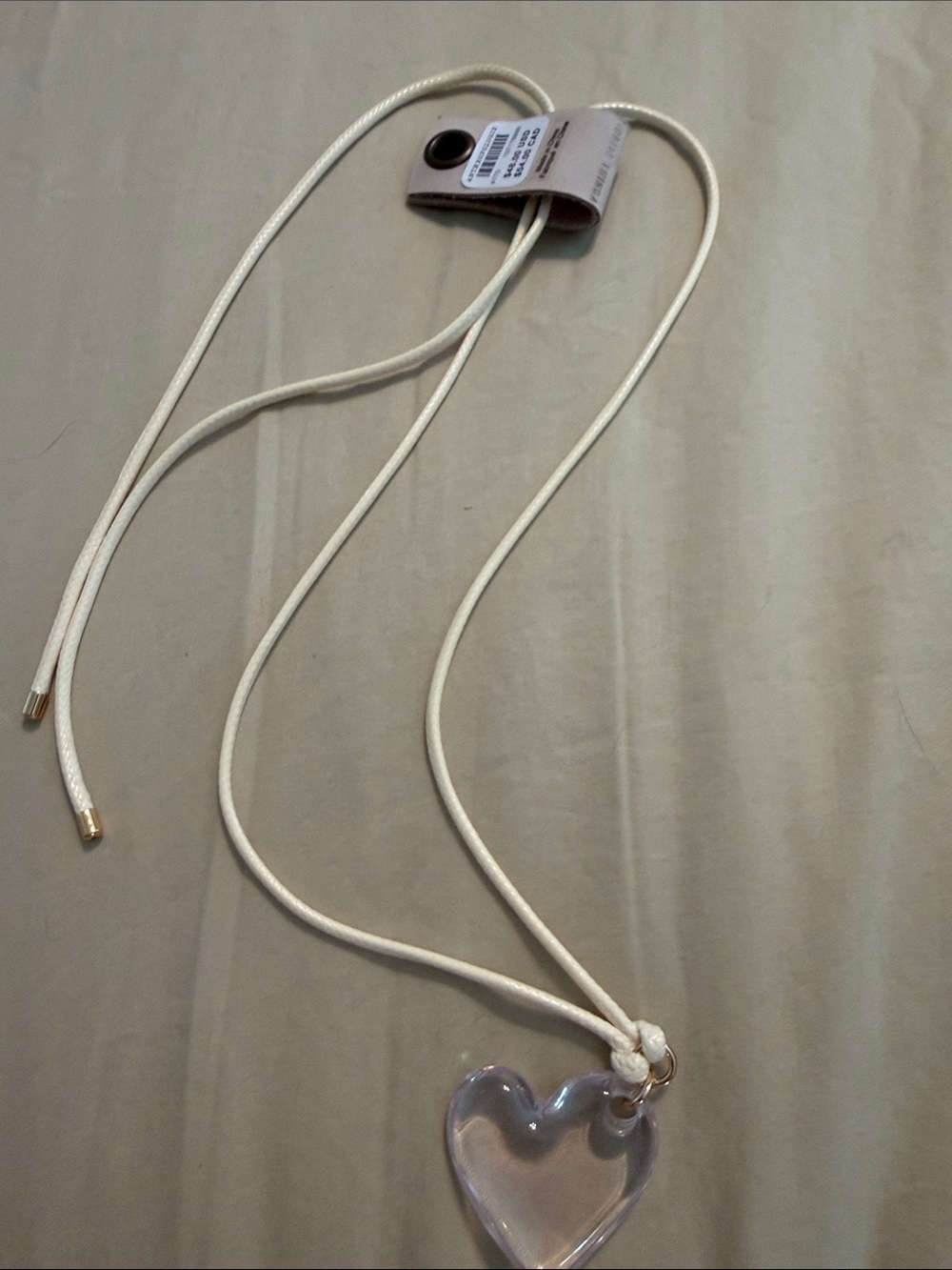 Anthropologie Cream Cord Necklace with Clear Heart Pendant
